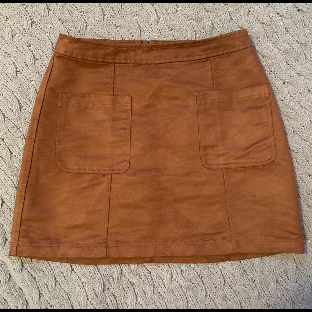 Woman’s brown suede skirt